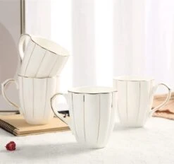 Lot De 4 Tasses à Café DUJUST (400 Ml), Design Britannique De Luxe Avec Garnitures Dorées Faites à La Main, Ensemble De Tasses En Porcelaine Blanche Et Dorée De 1ère Classe Pour Café, Thé Et Lait, Belles Tasses En Porcelaine Fine Et Ornée.